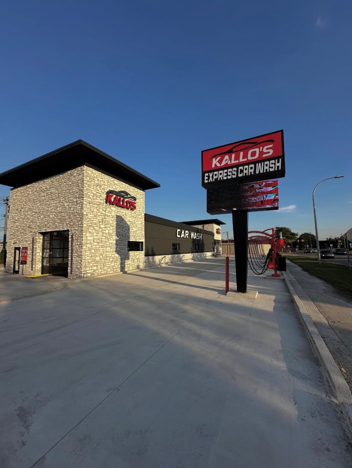 Kallo's Express Car Wash building and free self-serve vacuum stations at the Outer Drive location in Melvindale, Michigan